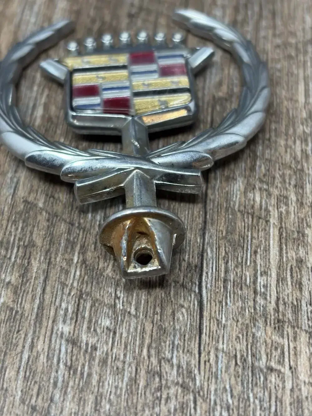 Vintage Iconic GM Cadillac crest and wreath hood ornament emblem with gold birds